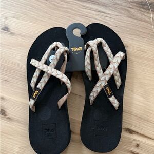 Teva Black Sandals with Tan Patterned Straps
